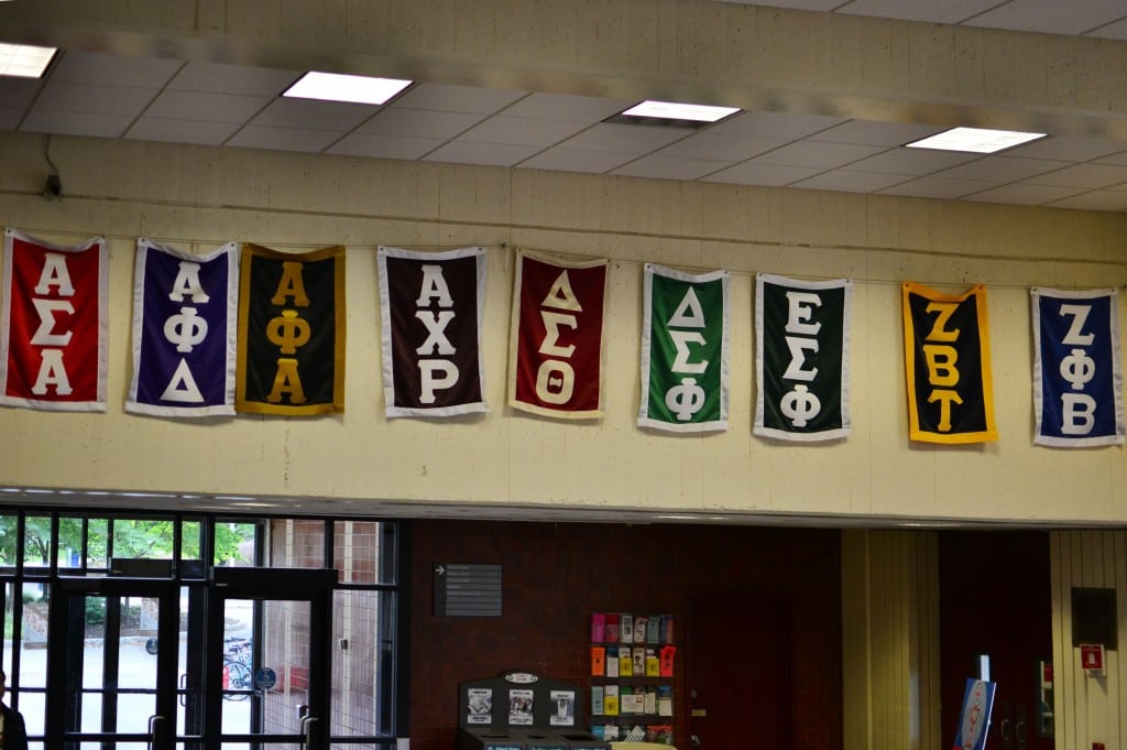 Greek organization banners are displayed in the lobby of the Stony Brook student union. (Nina Lin / The Statesman)