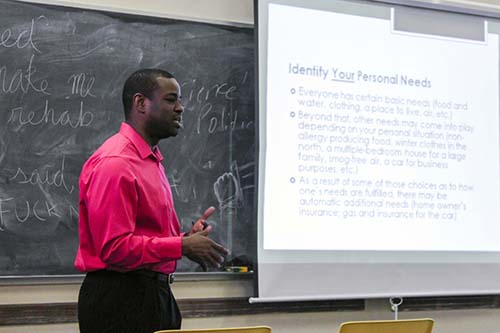 Dillon Beckford explains the importance of saving money and making wise financial decisions. (RYAN MUI / THE STATESMAN)
