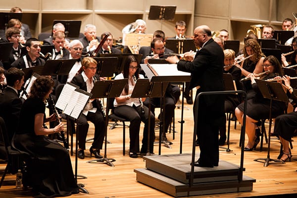 Bruce Engel leads the Stony Brook Wind Ensemble during the performance. (Nina Lin)