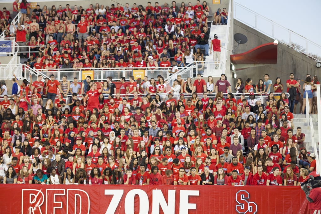 Stony Brook students show off their pride and enthusiasm clad in red in the Red Zone. (MANJU SHIVACHARAN/THE STATESMAN)