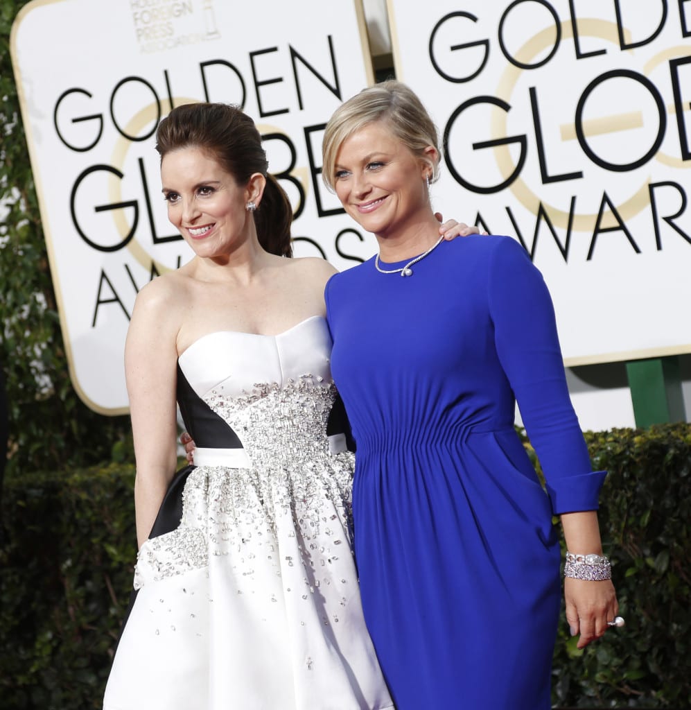 The 72nd annual Golden Globes Awards was the final time that comedians Tina Fey (left) and Amy Poehler would host the show. The two hosted for the past three years.  (LOS ANGELES TIMES / TRIBUNE NEWS SERVICE)