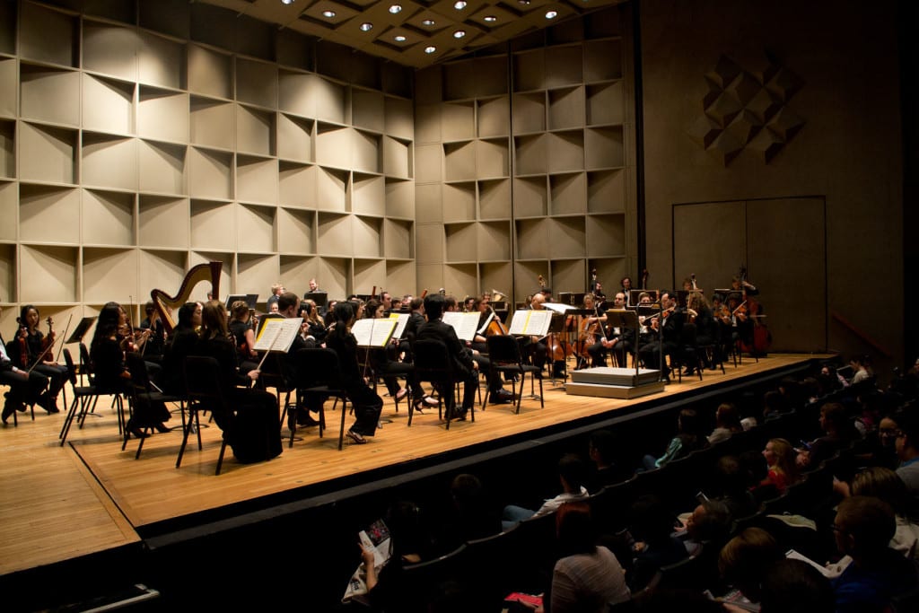The Stony Brook Orchestra, above, performed last semester to make up for a canceled concert. French horn player Amr Selim was the featured  performer. KYSTEN MASSA / THE STATESMAN