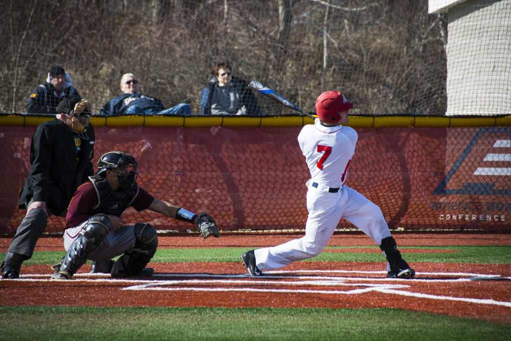 Toby Handley, No. 7, above, scored on a  single up the middle to put the Seawolves lead at 8-3 in their game against the Great Danes. MEGAN MILLER / THE STATESMAN
