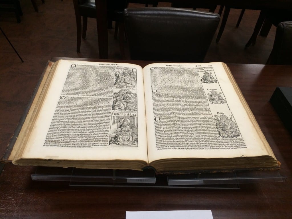 A 1498 copy of the Nuremberg Chronicle, which dictates world history in reference to the Bible, on display in Stony Brook Universitys Special Collections and University Archives on Wednesday, Oct. 21 2015. CHRIS GAINE / THE STATESMAN