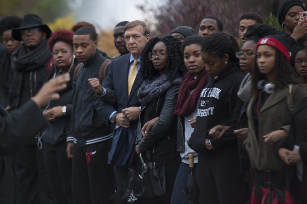 Stony Brook University President Samuel L. Stanley Jr. participates in a demonstration with Stony Brook students on Nov. 12, 2015. CHRISTOPHER CAMERON/THE STATESMAN
