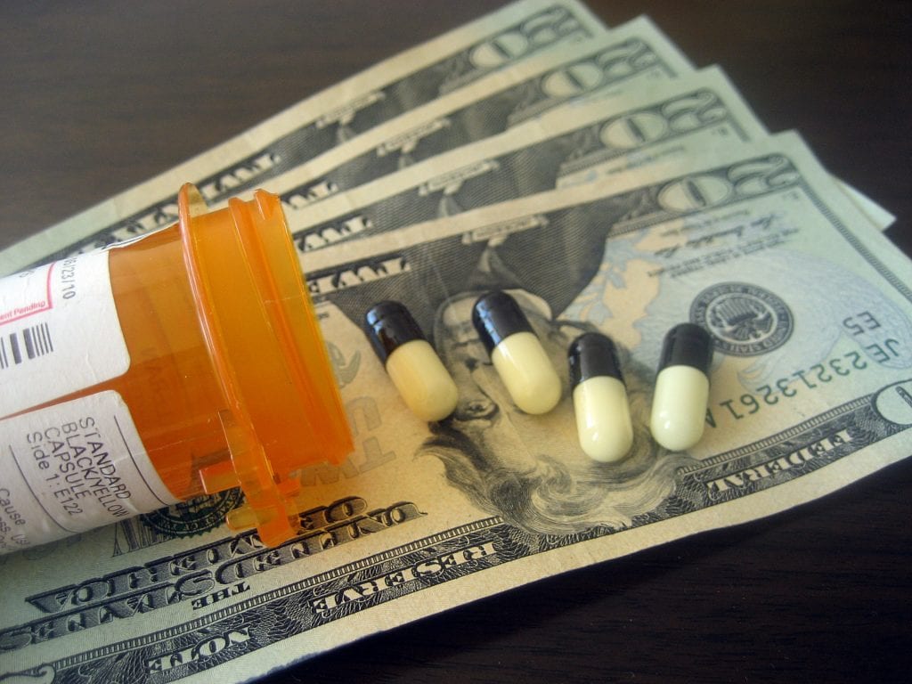 Pills and money 
IMAGES MONEY/FLICKR VIA CC BY 2.0