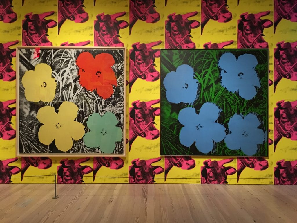 Andy Warhol’s “Flowers” series from 1964 and “Cow Wallpaper [Pink on Yellow]” from 1966 at the Whitney Museum in New York City. The exhibit is on display until March 31, 2019.BRIANNE LEDDA/THE STATESMAN