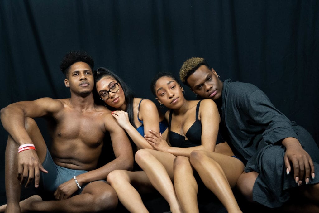 Models embrace during the Sex and Relationships photoshoot in Feb. 2019. GARY GHAYRAT/THE STATESMAN