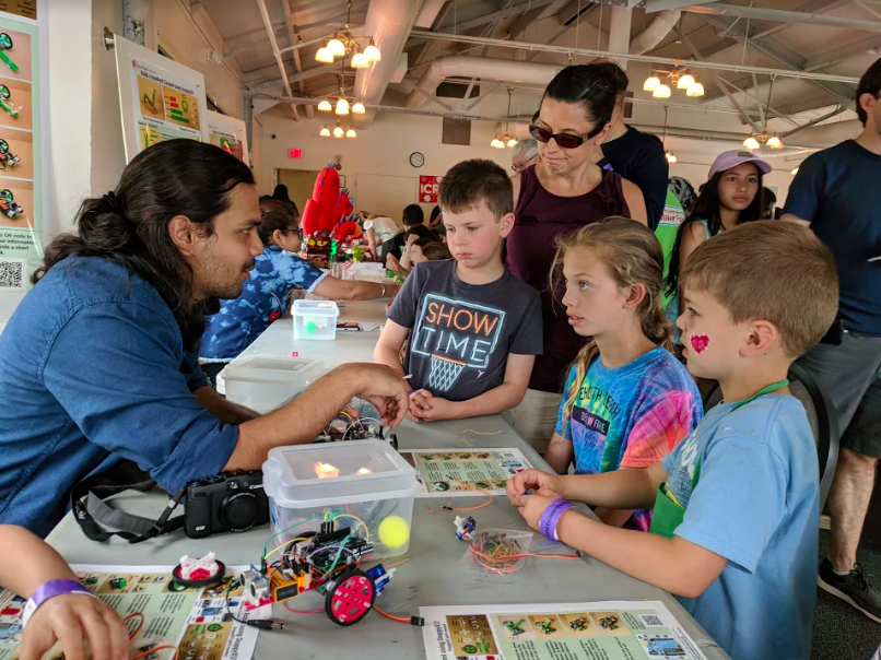 Children learning about “SnappyXO,” a kit created by aims to inspire elementary, middle and high schoolers to explore creative learning in the field of robotics and mechanical design. COURTESY OF SNAPPYXO