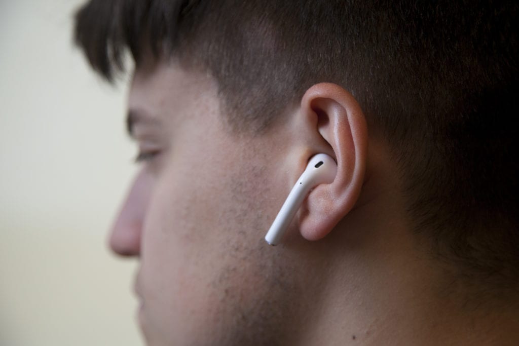A student wearing airpods.  EMMA HARRIS/THE STATESMAN