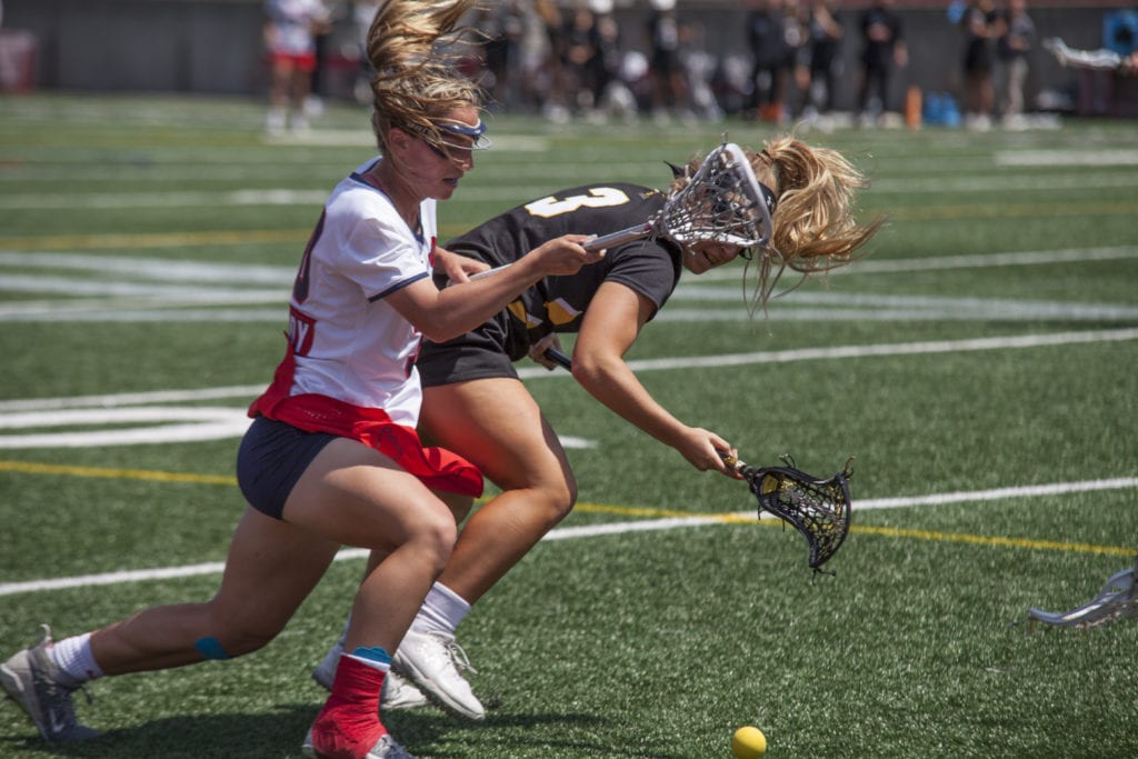 Ally Kennedy fights for the ball during the America East semifinal game against UMBC on Thursday, May 2. EMMA HARRIS/THE STATESMAN