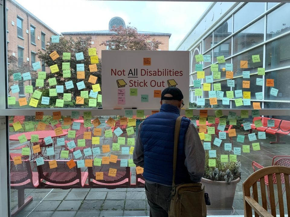 A window in the Student Activities Center adorned sticky notes about how disabilities have effected their life. GARY GHAYRAT/THE STATESMAN