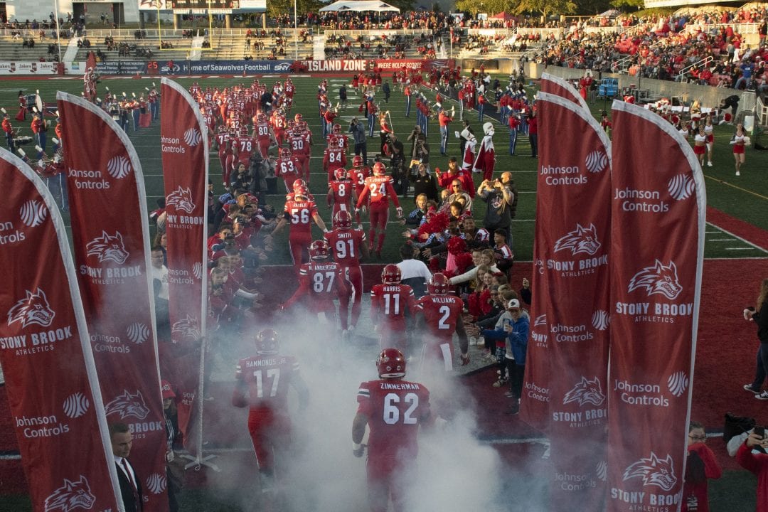 Stony Brook University Football Team runs out onto the field at the start of the Homecoming game on Oct. 5, 2019. SAMANTHA ROBINSON/STATESMAN FILE