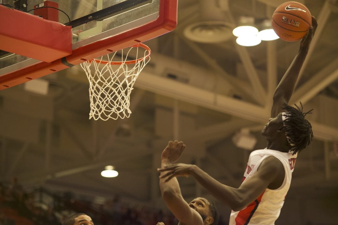 Mouhamadou Gueye jumps to make a basket during the Stony Brook Mens Basketball home opener against Yale on Nov. 5, 2019 EMMA HARRIS/STATESMAN FILE