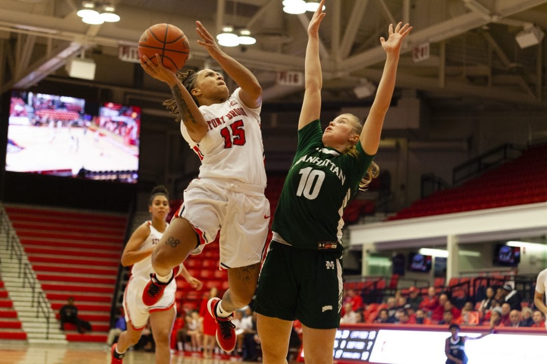 Hilare jumps to make a basket during the Stony Brook womens basketball home opener against Manhattan on Nov. 8. SARA RUBERG/THE STATESMAN