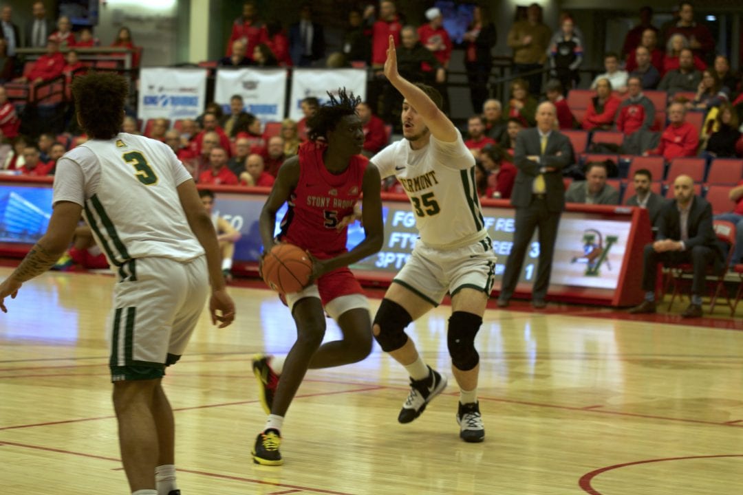 Gueye with the ball during the Stony Brook mens basketball teams home game against Vermont on Thursday. DESHAUN ROBINSON/THE STATESMAN