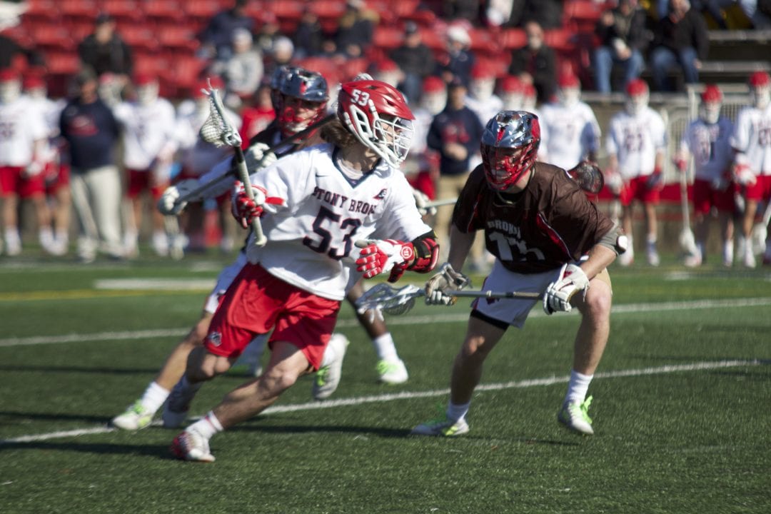 Pearson with the ball during the Stony Brook mens lacrosse game against Brown on Feb. 22.  EMMA HARRIS/THE STATESMAN