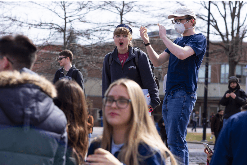 Students protesting outside of the Administration Building on March 11. The protests began over the administrations lack of communication about plans for the spring semester. SARA RUBERG/THE STATESMAN