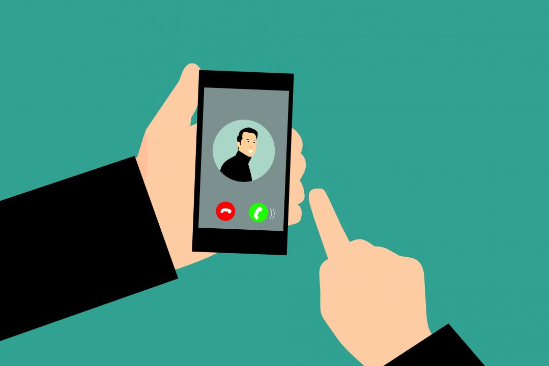A graphic of a person getting a phone call. PUBLIC DOMAIN
