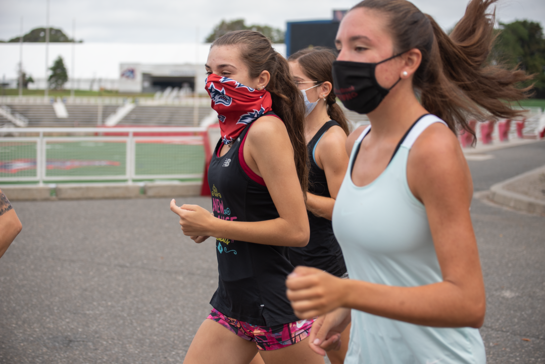 Womens cross country runners wearing masks at practice in the fall of 2020. SARA RUBERG/THE STATESMAN