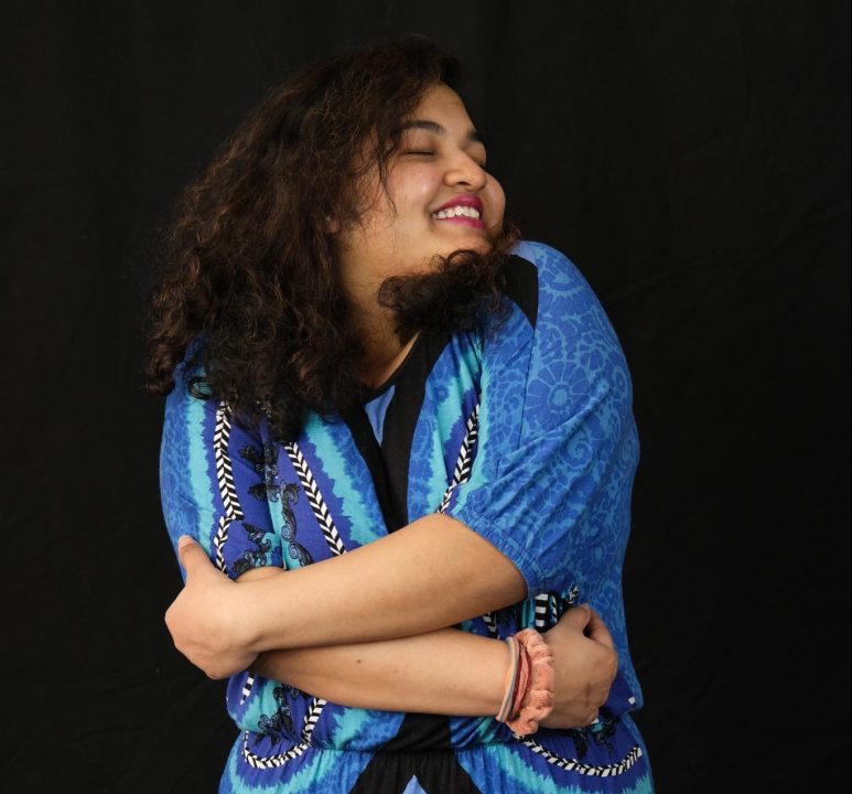 Tanya Sengupta hugs herself for The Statesmans Sex and Relationships issue. RABIA GURSOY/STATESMAN FILE