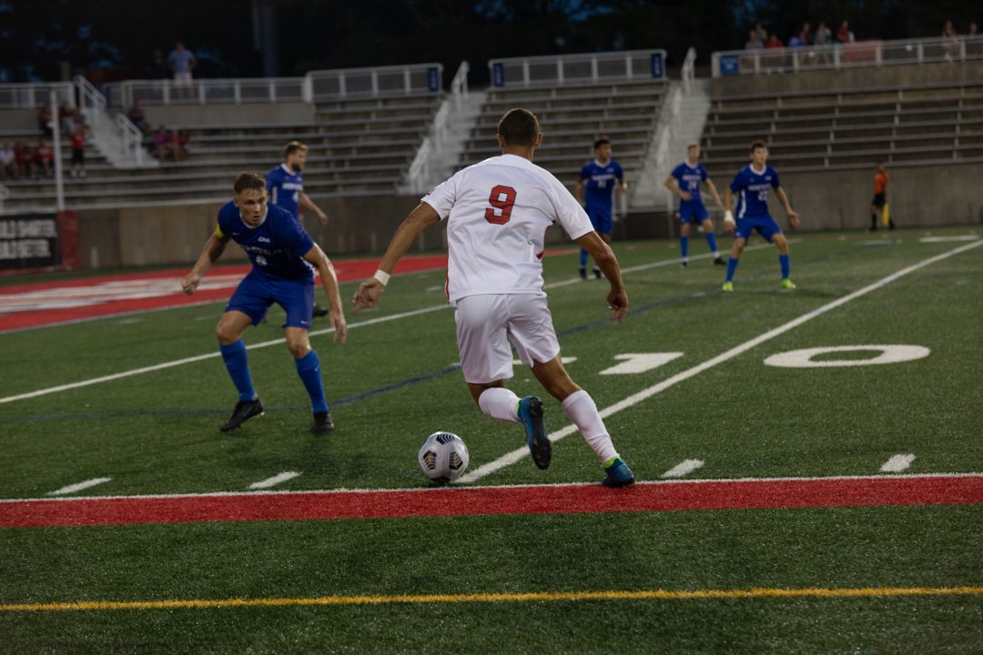 Senior Cameron Bonfils going after the ball in the game against Hofstra on Aug. 30. Bonfils scored his first goal after four years on the roster. JOCELYN CRUZ/THE STATESMAN