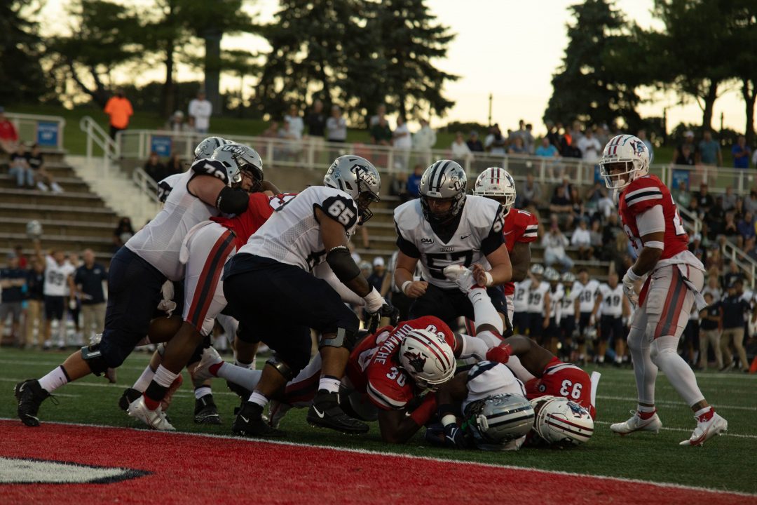 The Seawolves in a tackle with the University of New Hampshire WIldcats on Sept. 2. The Seawolves will be facing one of their toughest opponents, the Oregon Ducks, on Sept. 18. TIM GIORLANDO