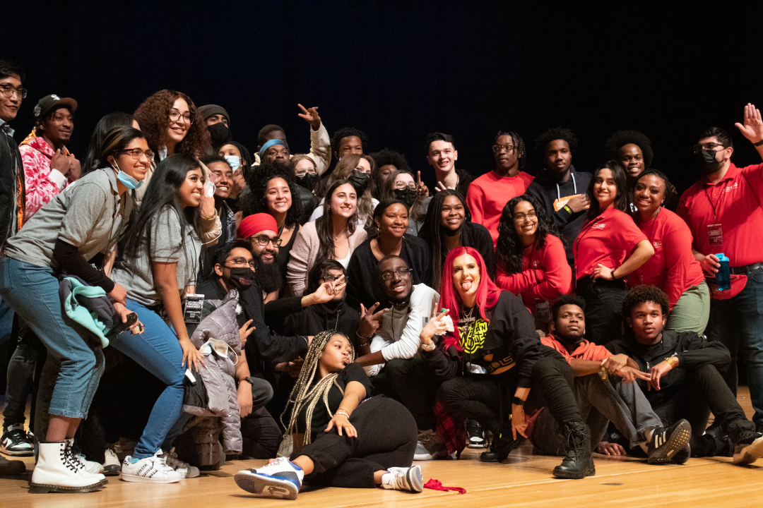 A group of students with the cast of Wild n Out on stage after the show on Feb. 10.SHERIN SAMUEL/THE STATESMAN