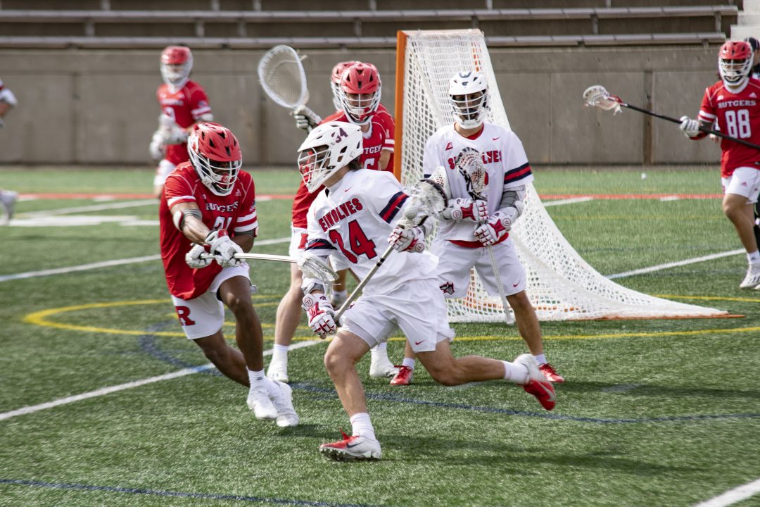 Attackman Dylan Pallonetti with the ball in the game against No. 4 Rutgers on Saturday, March 5. Pallonetti tied for the team lead with five goals. ETHAN TAM/THE STATESMAN