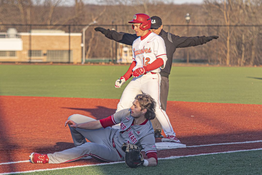 Stony Brook third baseman Evan Giordano after tripping over the Sacred Heart first baseman on Wednesday, March 2 ETHAN TAM/THE STATESMAN