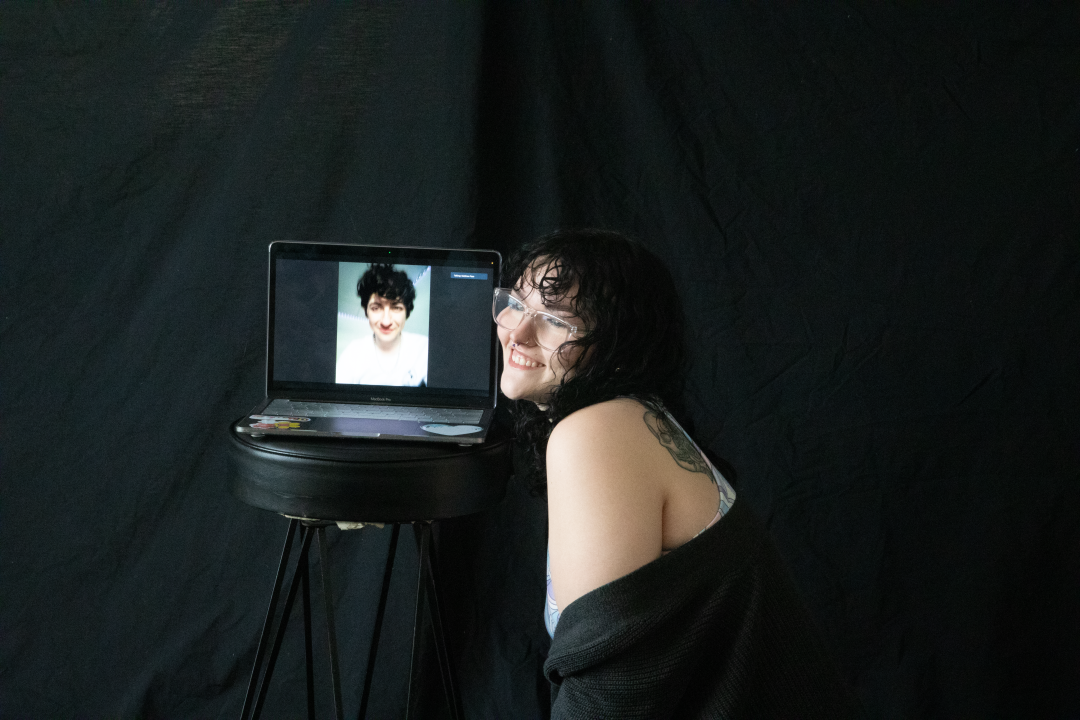 Abbigail Stanley with her partner on a Zoom call during the 2022 Sex and Relationships Photoshoot. Stanley is currently in a long-distance relationship. SYDNEY RIDDLE/THE STATESMAN