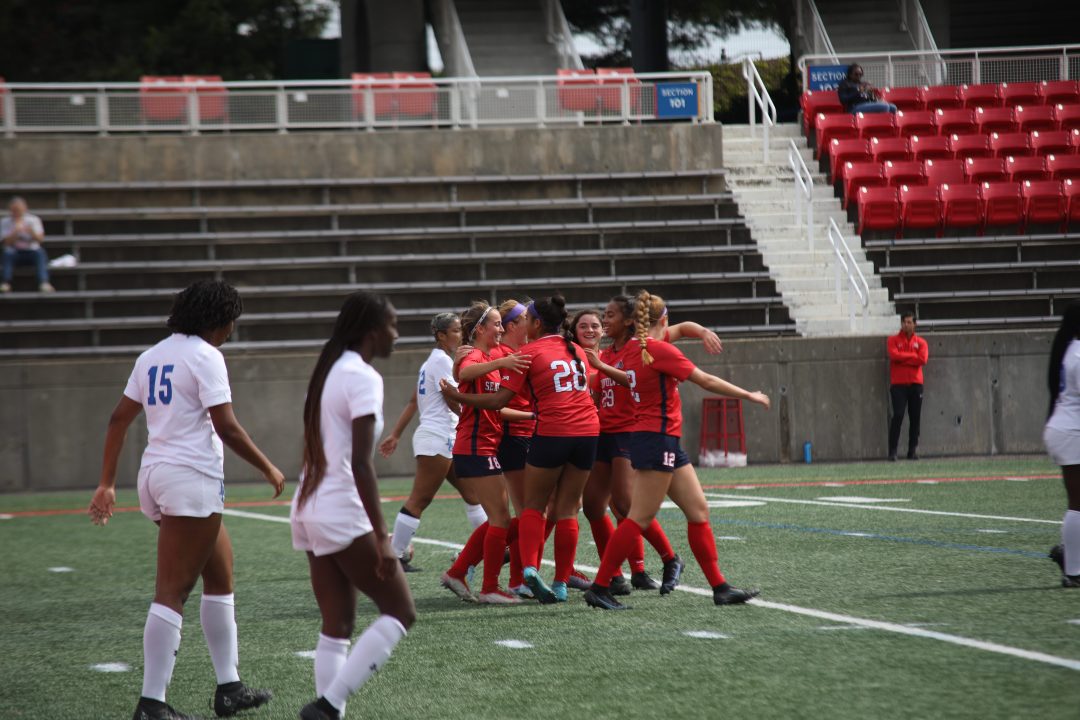 A group of Stony Brook womens soccer players celebrating in a game against Hampton on Sept. 25. The team wrapped up its road trip with a tie at Drexel. CAMRON WANG/THE STATESMAN 