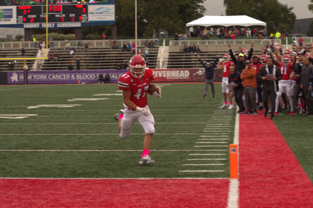 Running back Ross Tallarico scoring his first career touchdown on Saturday, Oct. 1 against William & Mary. Tallarico has gone from being a walk-on backup to one of the biggest difference-makers on the 2022 Stony Brook football team. CAMRON WANG / THE STATESMAN