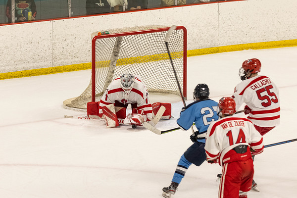 Goalkeeper Scott Barnikow saving a shot in a game against Rhode Island on Friday, Oct. 28. The Stony Brook club hockey team split a two-game series with No. 24 Rhode Island, suffering its first loss of the season. PHOTO COURTESY OF AZTEKPHOTOS