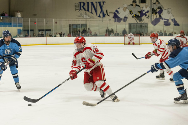 Right winger Michael Galinski moving the puck in a game against Rhode Island on Friday, Oct. 28. The Stony Brook club hockey team both won and lost a game this past weekend. PHOTO COURTESY OF AZTEKPHOTOS