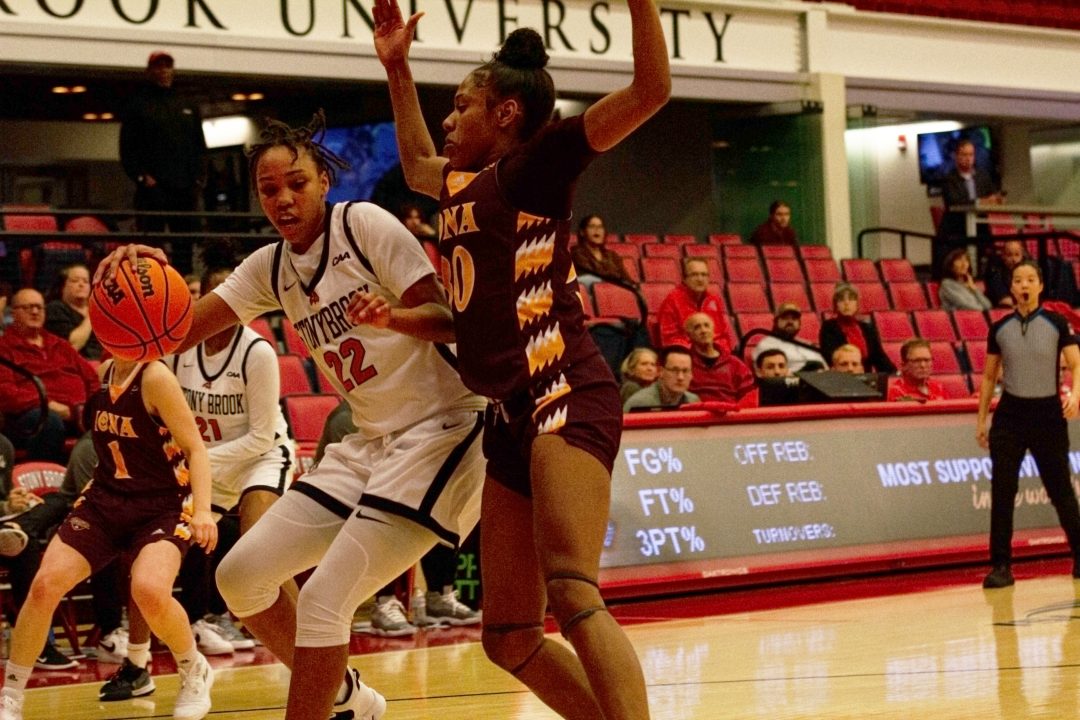 Forward Sherese Pittman handling the ball in the low post against Iona on Thursday, Nov. 10. Pittman scored the game-winning bucket against the Gaels, completing a come-from-behind victory for Stony Brook. ONESUN JEONG/THE STATESMAN