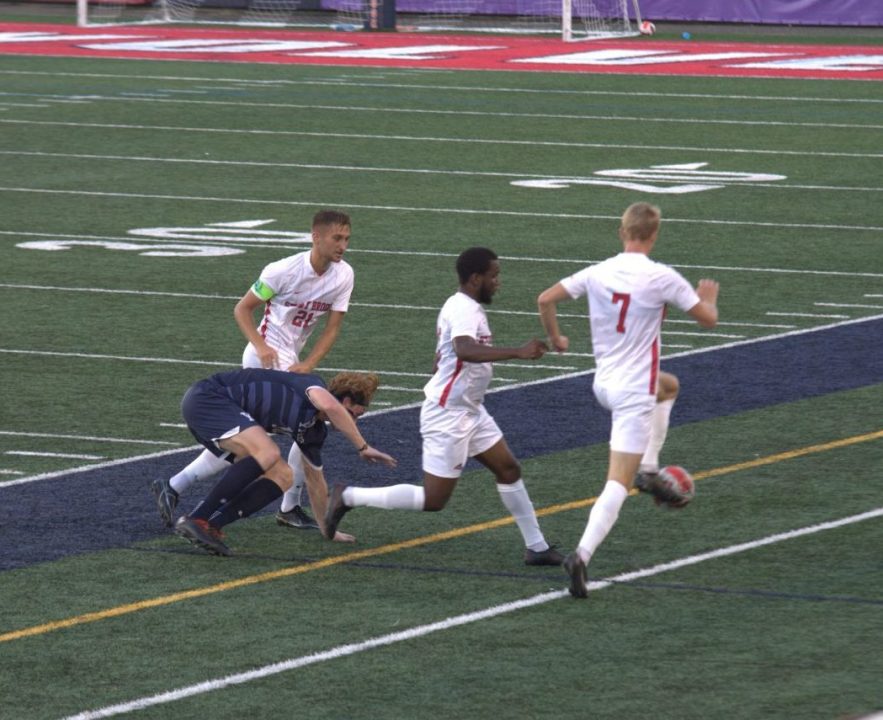 Midfielder Trausti Birgisson and defenders Rondell Payne and Sebastian Rojek in action against Yale on Thursday, Sept. 20. The three seniors were key players on the 2022 Stony Brook mens soccer team. MACKENZIE YADDAW/THE STATESMAN