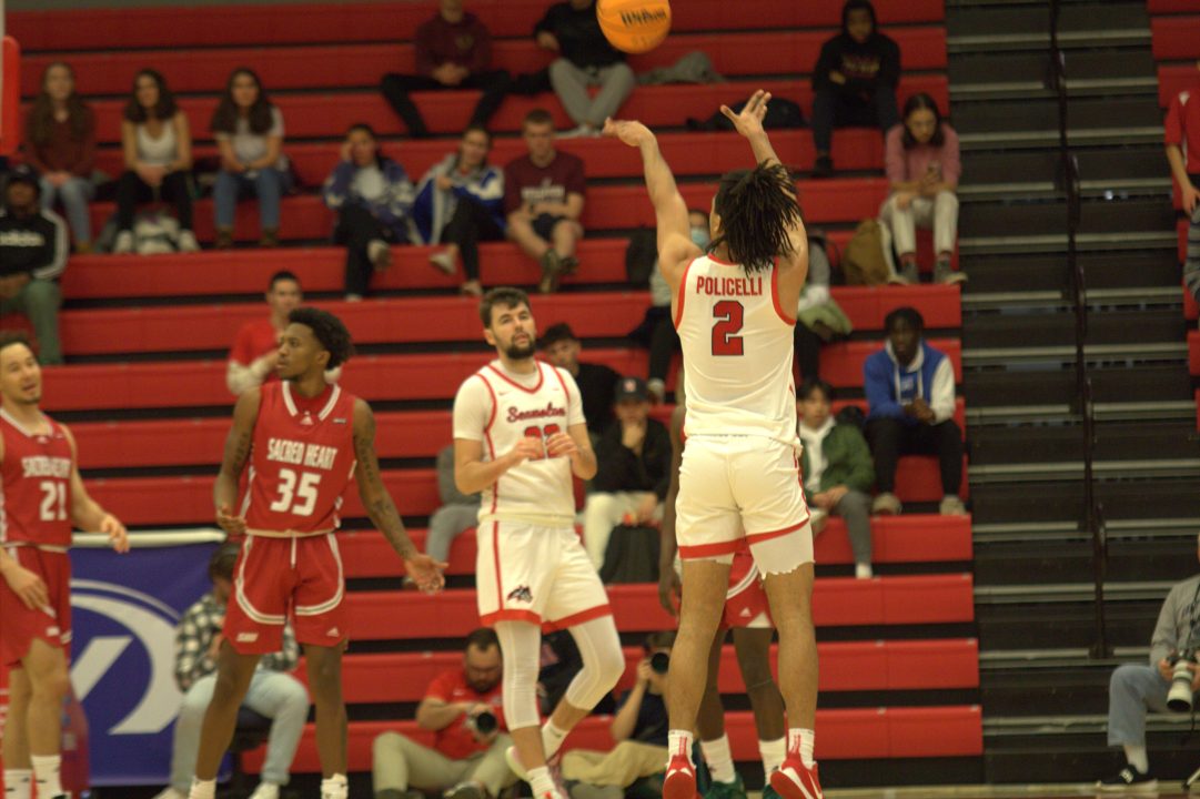 Forward Frankie Policelli shooting a three-pointer while forward Kenan Sarvan looks on in a game on Monday, Dec. 12 against Sacred Heart. The Stony Brook mens basketball team could not complete the comeback against Wagner on Thursday despite Policellis strong performance. BRITTNEY DIETZ/THE STATESMAN