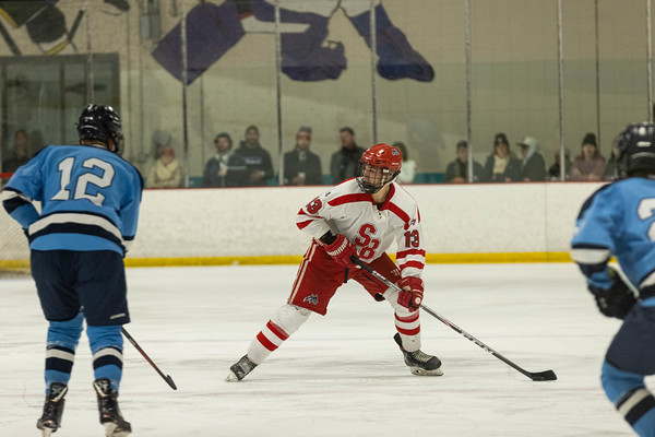 Left defenseman Dom Molfetto looking to pass the puck against Rhode Island on Saturday, Oct. 29. Molfetto scored his second goal of the season during the Stony Brook club hockey teams series at Ohio. PHOTO COURTESY OF AZTEKPHOTOS