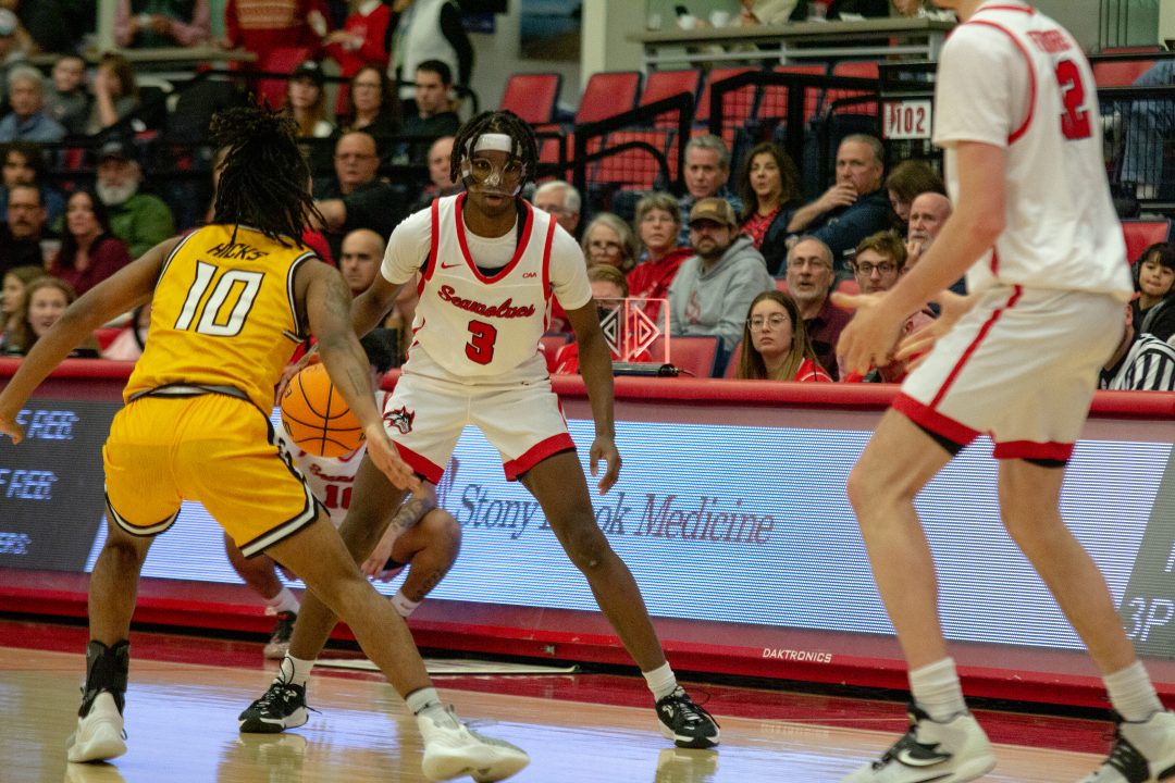 Guard Toby Onyekonwu handling the ball against Towson on Saturday, Jan. 7. The Stony Brook mens basketball team suffered a tough loss on Saturday despite outplaying N.C. A&T for most of the game. BRITTNEY DIETZ/THE STATESMAN