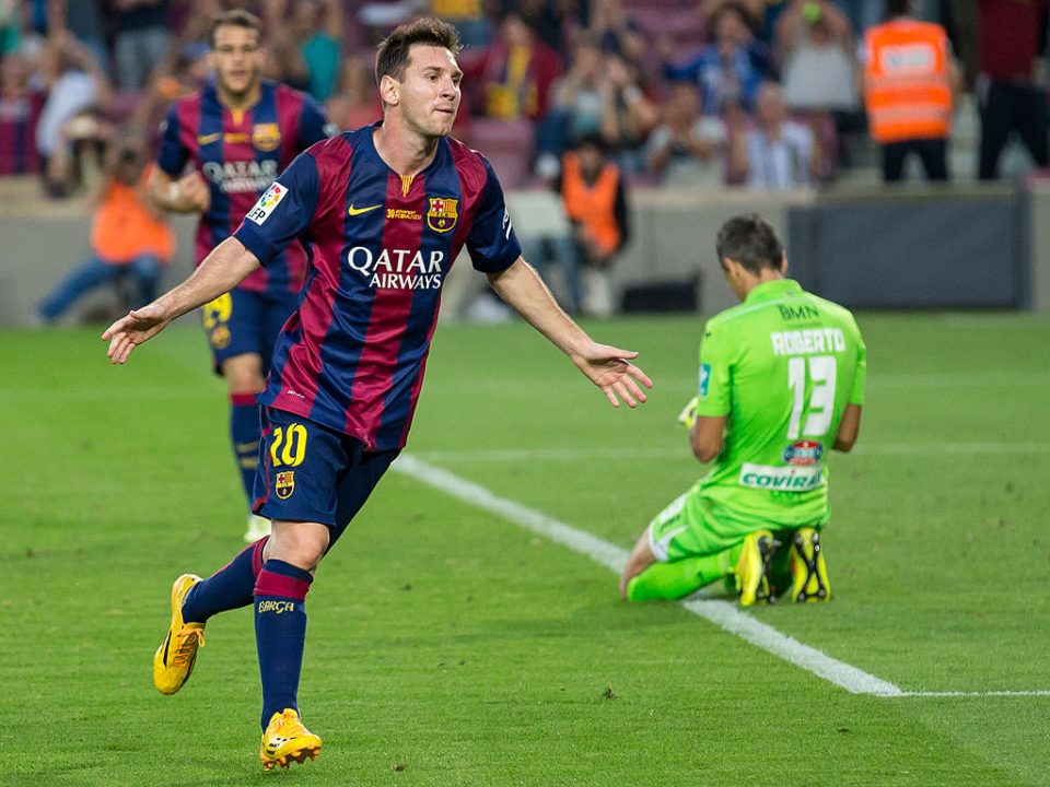 Lionel Messi celebrating scoring a goal against Granada CF in October 2014. PUBLIC DOMAIN
