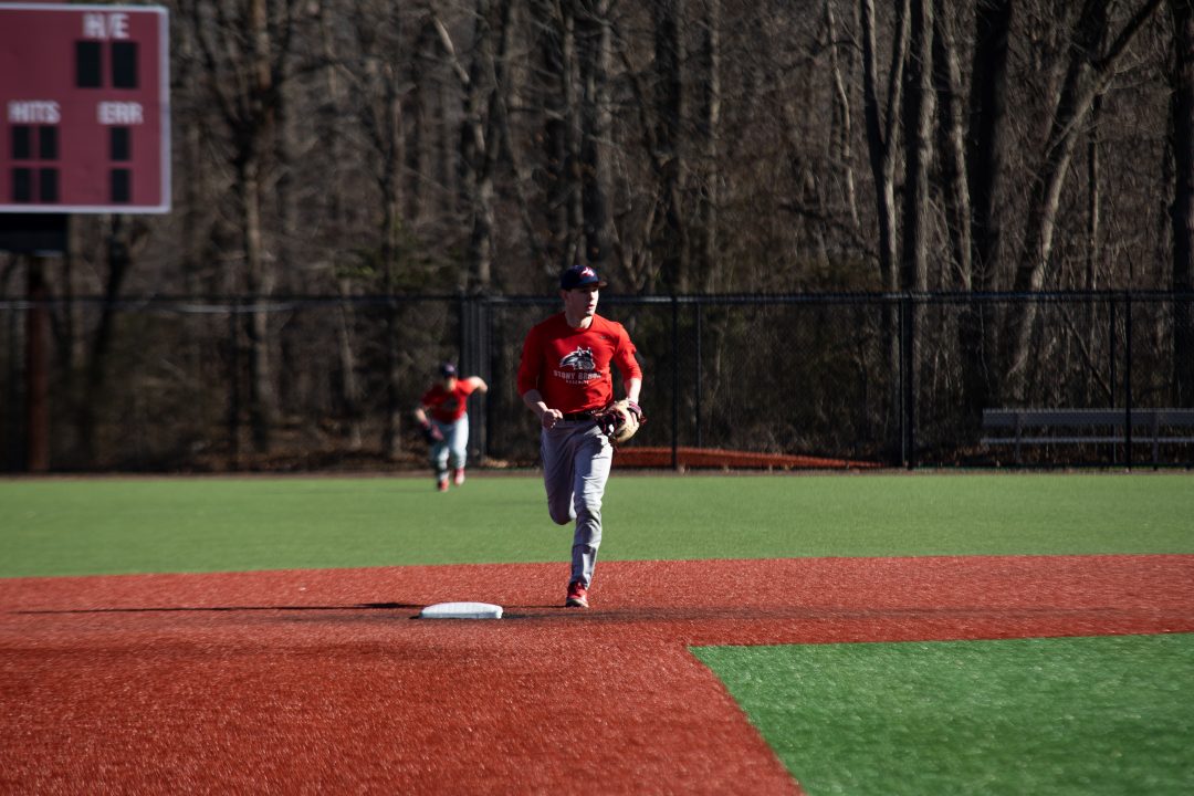 Second baseman Johnny Pilla running to cover second base in a practice on Friday, Feb. 10. Pilla had two hits in his first-career start on Saturday. KAT PROCACCI/THE STATESMAN