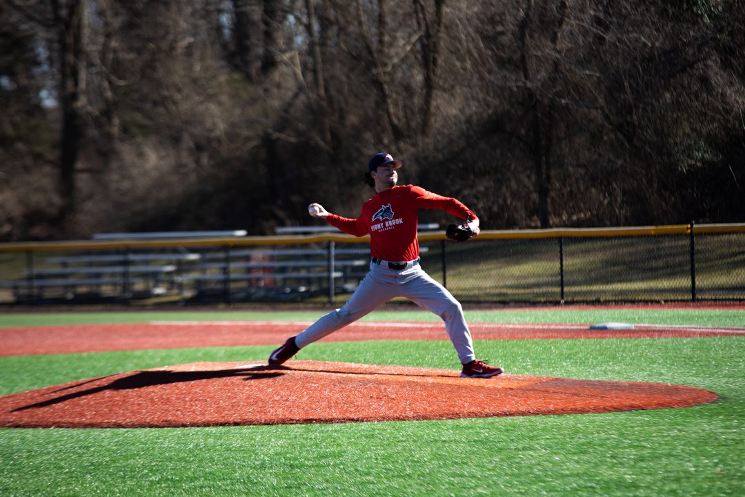 Starting pitcher Nick DeGennaro pitching at an intrasquad scrimmage on Friday, Feb. 10. DeGennaro is making a highly-anticipated return from Tommy John Surgery this year. KAT PROCACCI/THE STATESMAN