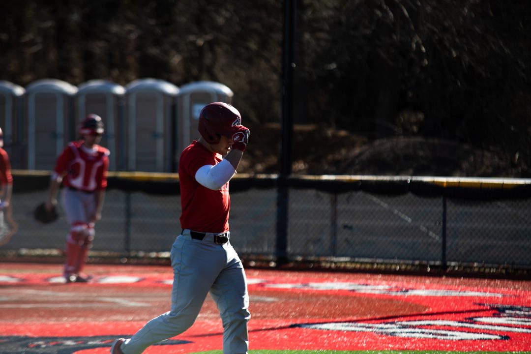 Catcher Chris Leone jogging off the field in practice on Friday, Feb. 10. The Stony Brook baseball team was swept on the west coast to open the season. KATHERINE PROCACCI/THE STATESMAN