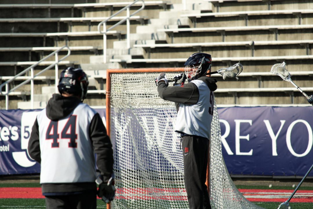 Attackmen Jonathan Huber (left) and Will Danowski (right) during practice on Monday, Feb. 6. Huber scored his first goal as a part of the Stony Brook mens lacrosse team on Saturday against Penn State. MAYA DUCLAY/THE STATESMAN 