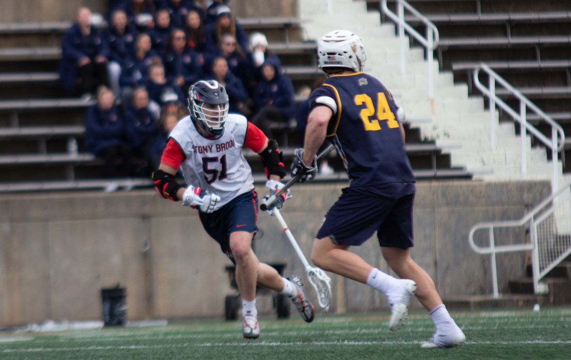 Midfielder Matt Anderson  running down the field in a scrimmage Marrimack College on Jan. 28. The  reigning All-America East selection looks to lead the Stony Brook mens lacrosse team to a CAA  championship. BRITTNEY DIETZ/THE STATESMAN