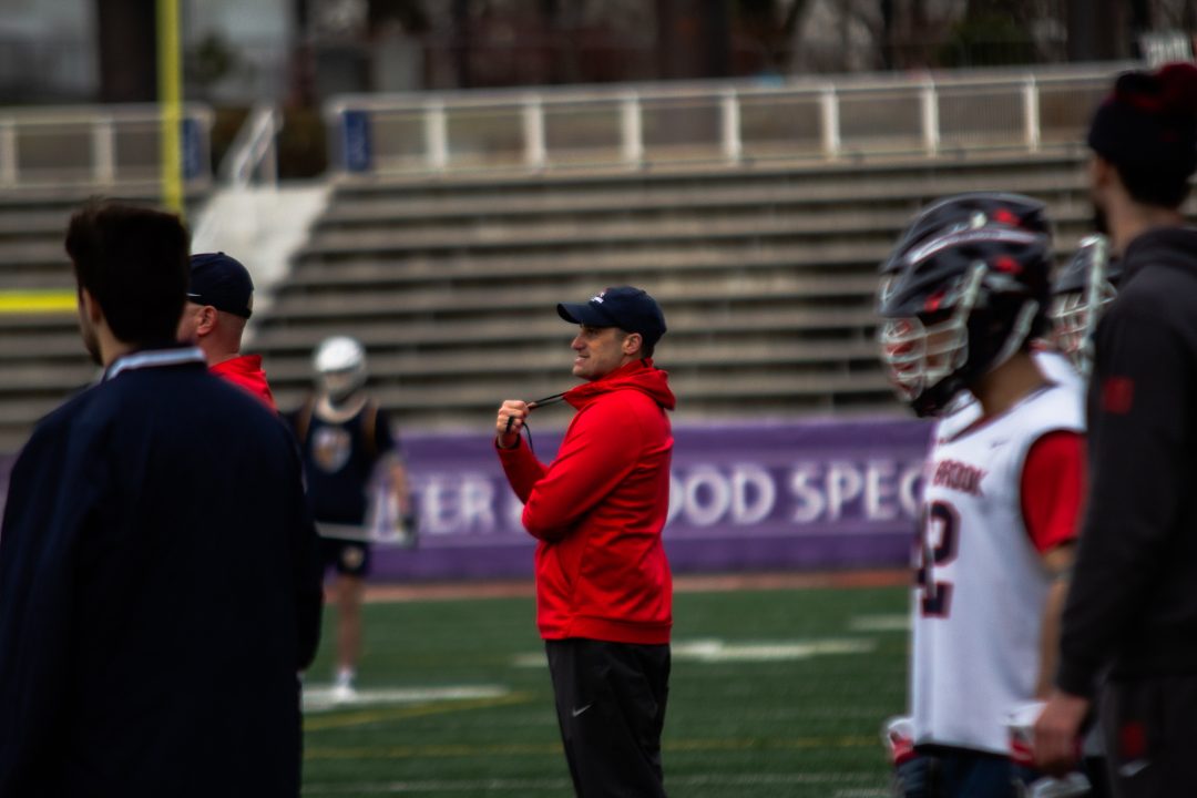 Stony Brook mens lacrosse head coach Anthony Gilardi on the sidelines during a scrimmage on Saturday, Jan. 28. The Seawolves look to compete in their first season in the CAA. BRITTNEY DIETZ/THE STATESMAN