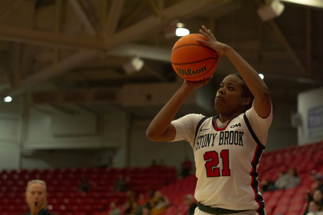 Guard Kelis Corley shooting from the corner against Towson on Sunday, Jan. 29. The Stony Brook womens basketball team lost its second meeting of the year with Towson on Thursday. VIKRAM SETHI/THE STATESMAN