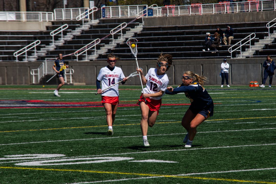 Midfielder Ellie Masera carries the ball against Drexel on Sunday, April 2 while attacker Kailyn Hart looks on. Along with midfielder Jaden Hampel, the two of them posted hat tricks at Monmouth. TIM GIORLANDO/THE STATESMAN