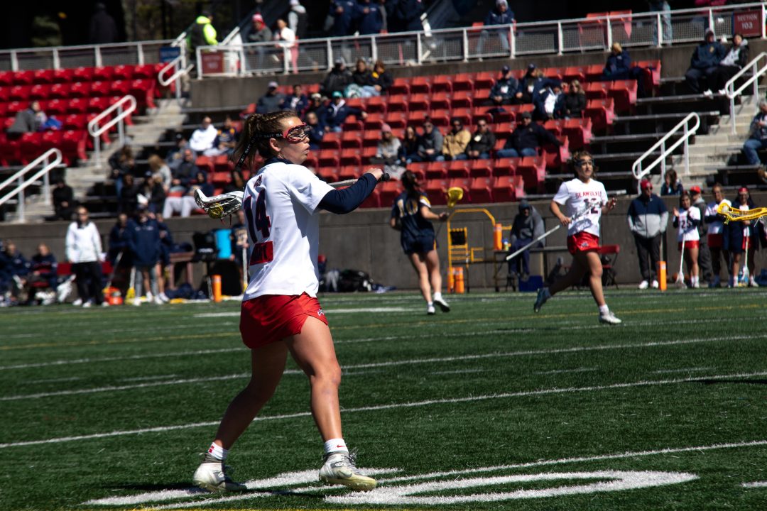 Attacker Kailyn Hart (foreground) passes the ball against Drexel while midfielder Ellie Masera (background) tries to get open on Sunday, April 2. Hart scored four goals in the Stony Brook womens lacrosse teams loss to Loyola Maryland. TIM GIORLANDO/THE STATESMAN